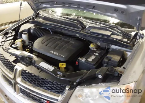 2013 Dodge Grand Caravan Sxt z USA, uszkodzony, nr VIN 2C4RDGCG0DR575322